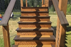 Duxxback Composite decking in Warm Cedar and Black Walnut